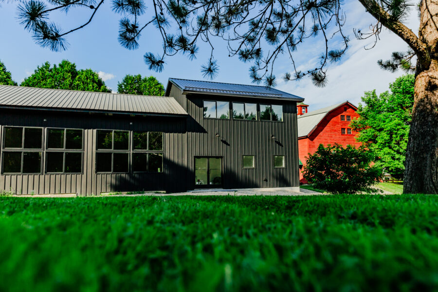 Industrial wedding venue in Maine with black siding