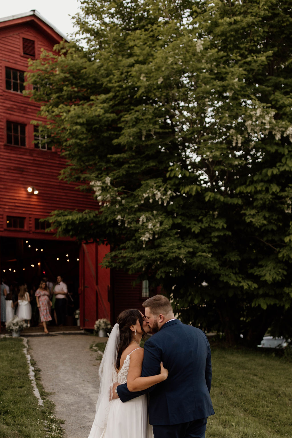 a table set for a wedding reception at Meadow Ridge Farm a luxury rustic maine barn wedding venue